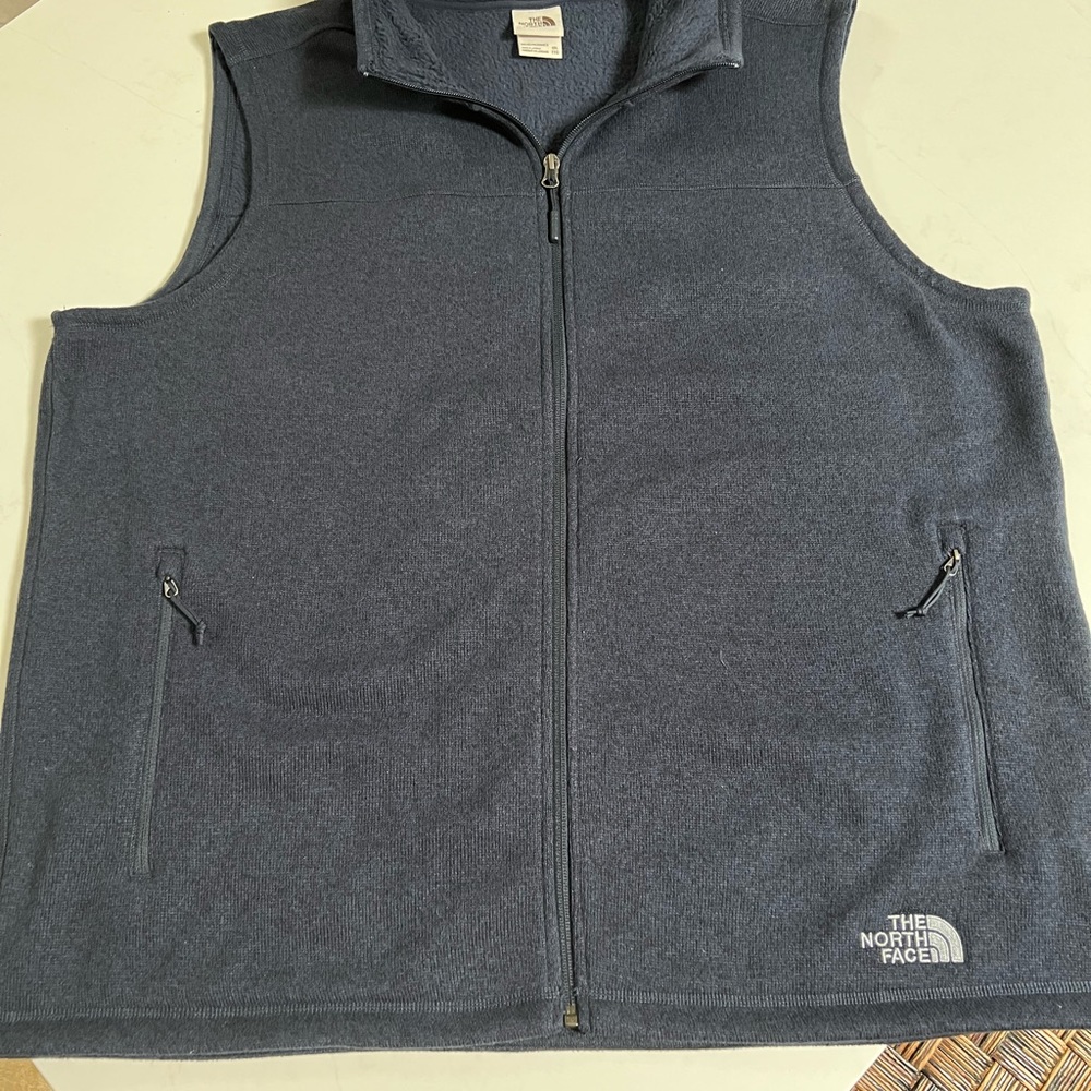 The North Face Navy Blue Fleece Vest.  Never Worn… NWOT.